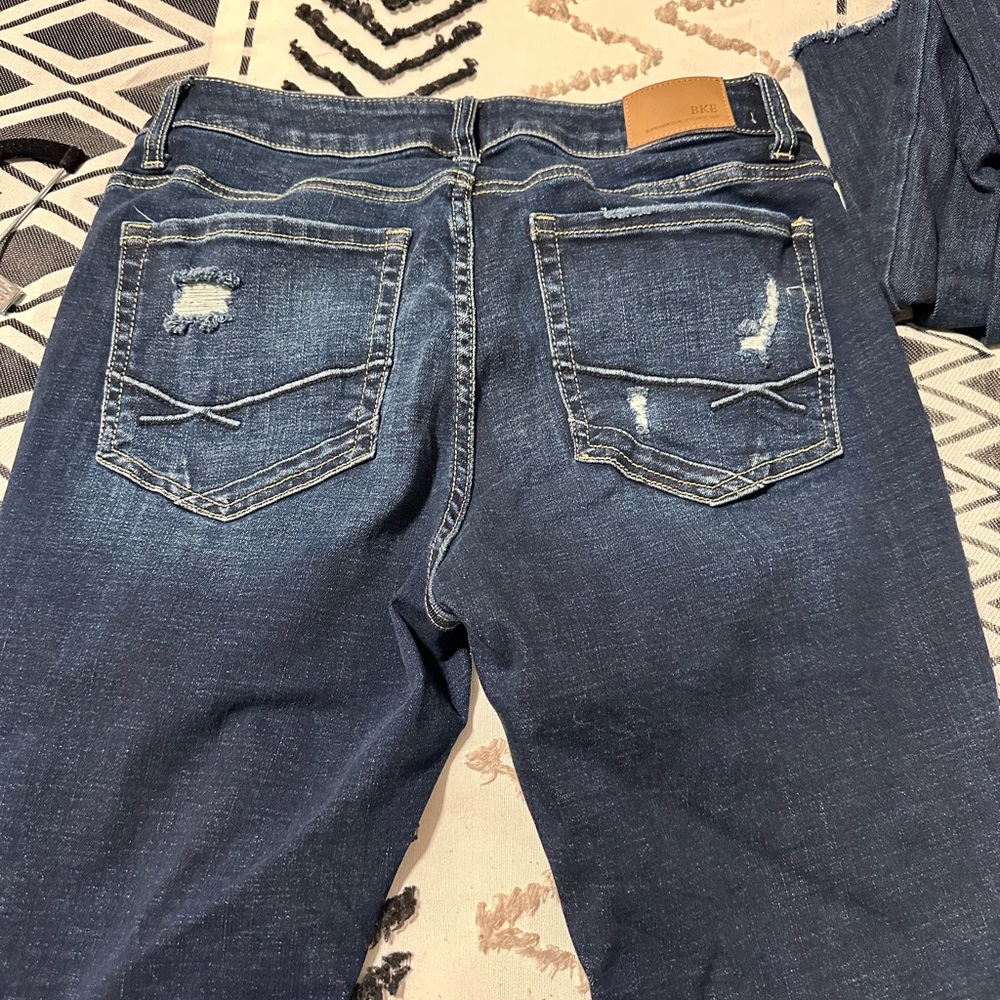 Buckle Skinny Jeans